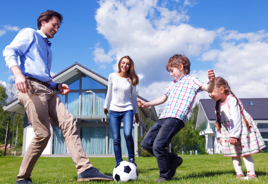 family playing soccer