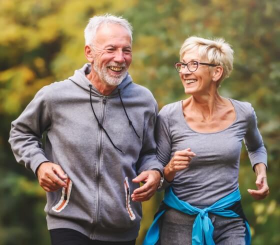 mature couple jogging outdoors