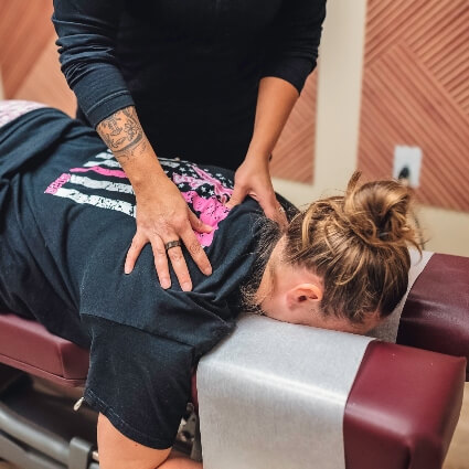 Dr Brandy adjusting patients back