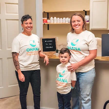 Dr Brandy and family at front desk
