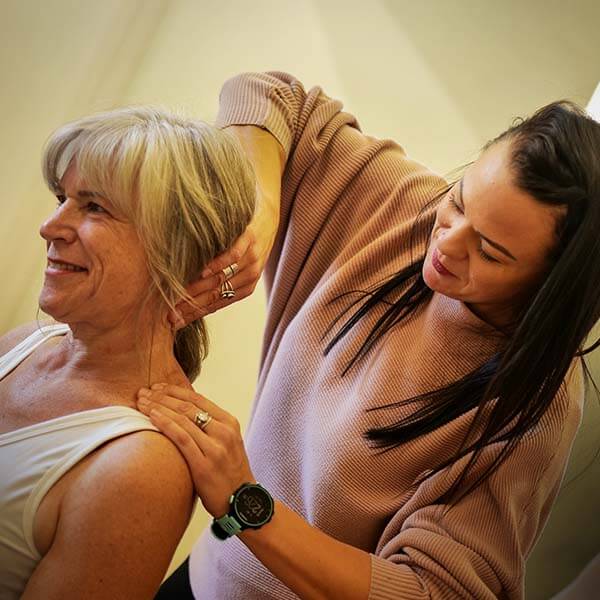 Dr. Michelle adjusting neck