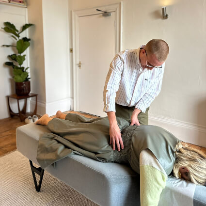 Dr Callum adjusting patient