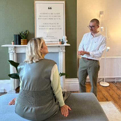 Dr Callum consulting with patient