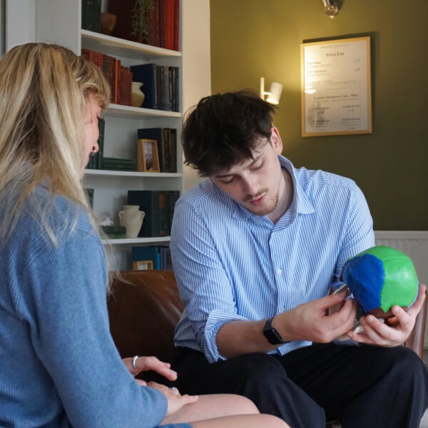 Bristol Chiropractor talking to patient