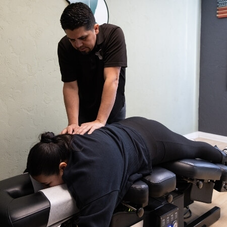 Upper-back adjustment for female patient