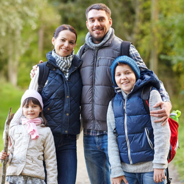 Smiling family of four