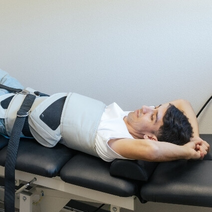 Male patient ion spinal decompression table