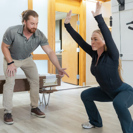 Colorado Springs patient performing exercises at Whole Health Springs