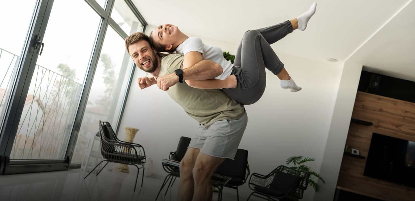 Two young adults laughing and having fun