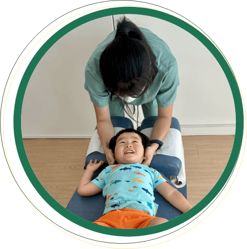 Subang Jaya chiropractor adjusting childs neck