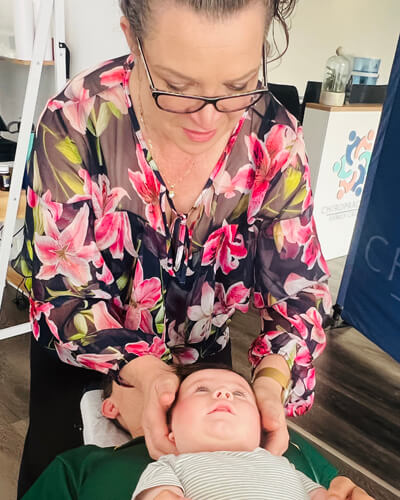 adjusting baby's neck