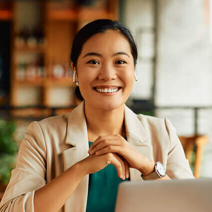 woman in business suit smiling