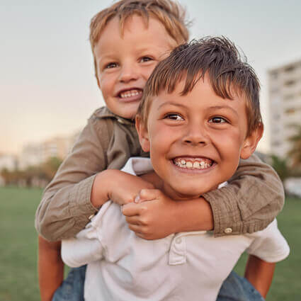 Boys piggyback