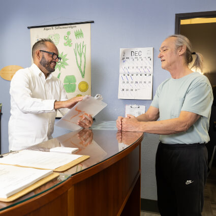 Austin patient checking in  at Family Wellness Center