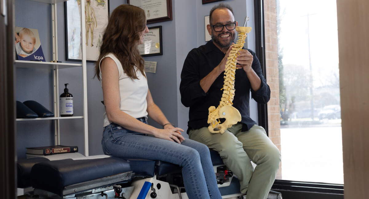 Austin patient in a chiropractic consultation at Family Wellness Center