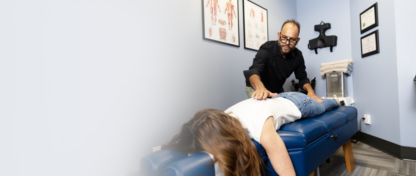 Austin patient receiving a chiropractic back adjustment