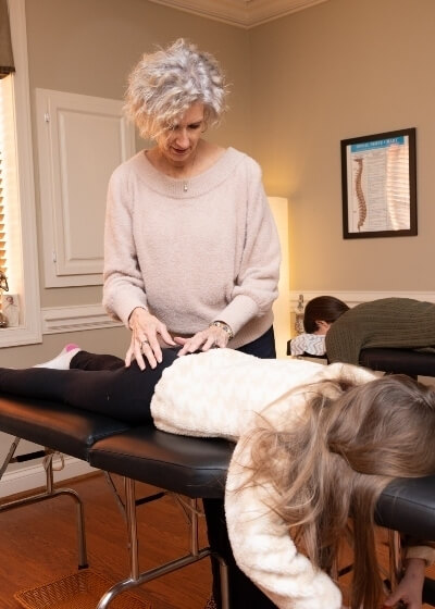 Dr Ginni adjusting kids back