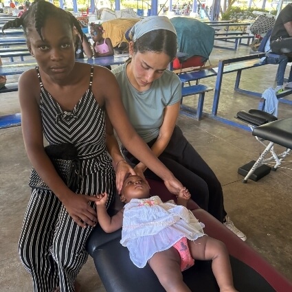 Young female patient treated with chiropractic care