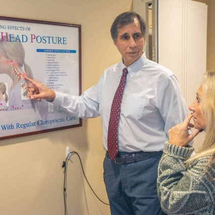 Dr Gavric talking with patient