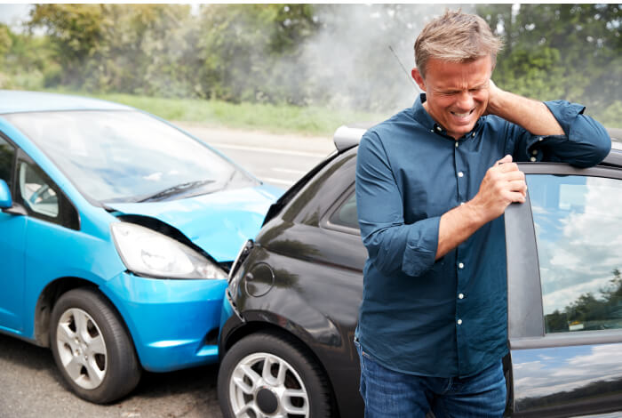 man with neck pain after auto accident