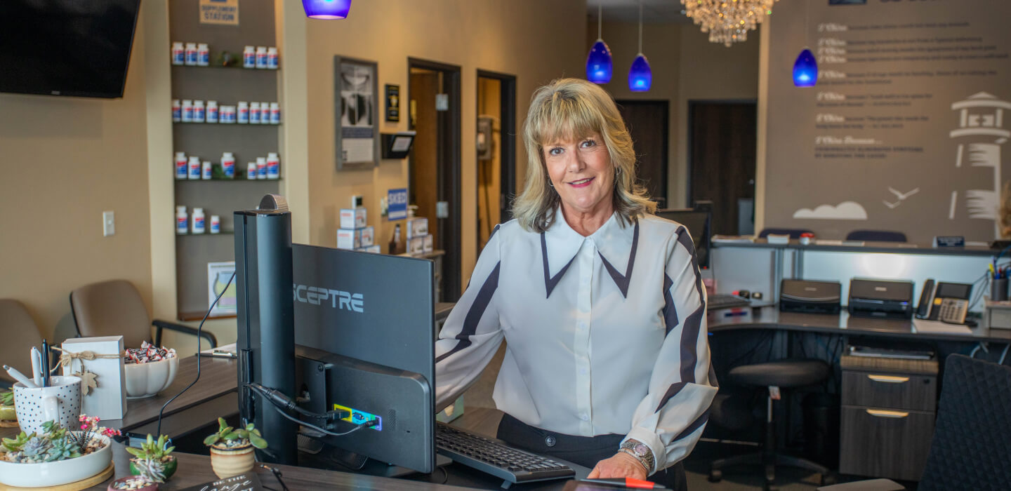 Gavric Chiropractic Clinic front office team member smiling