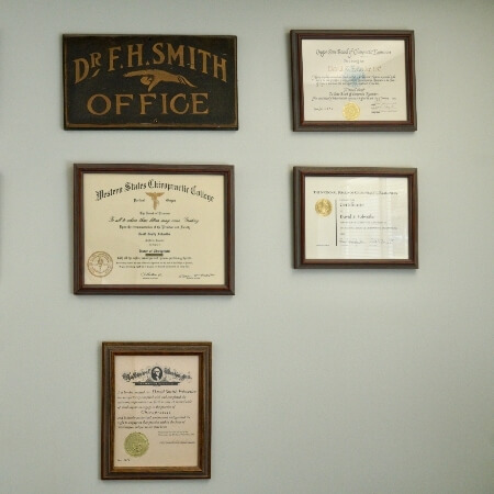 Certificates hanging on wall