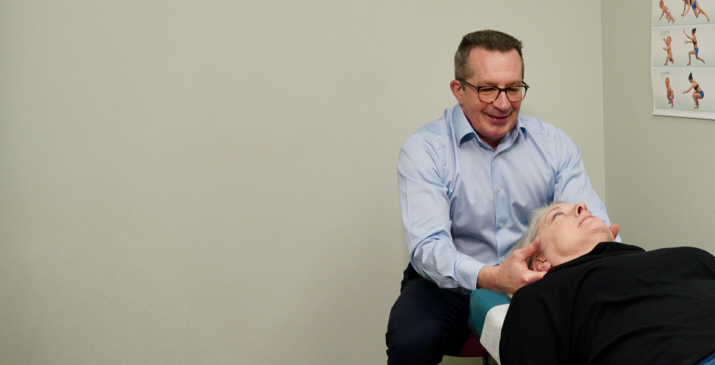 Seattle patient treated with a chiropractic neck adjustment at Folweiler Chiropractic
