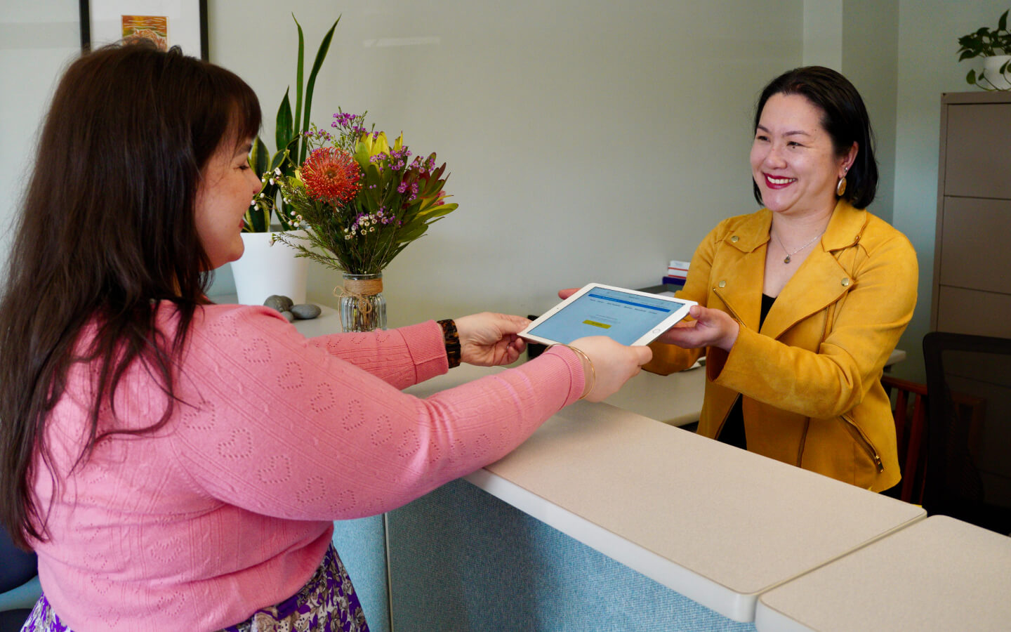 Seattle patient checking in at Folweiler Chiropractic
