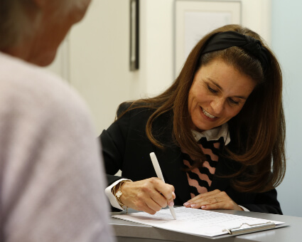 East Horsley patient checking in at Horsley Chiropractic Healthcare