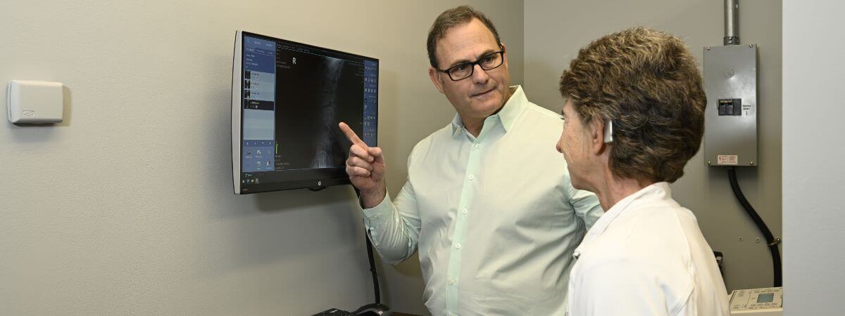 Myrtle Beach chiropractor in a consultation with a patient