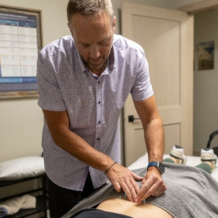 acupuncture needles in patients back