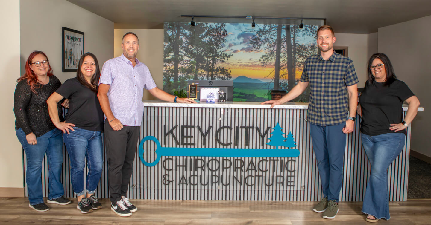 Our Key City Chiropractic & Acupuncture team at our front desk