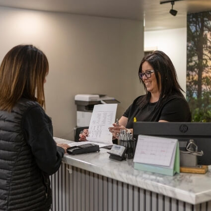 patient checking in at our front desk