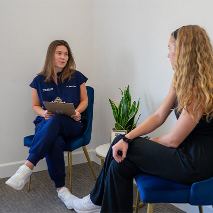 Dr. Jenni meeting with patient