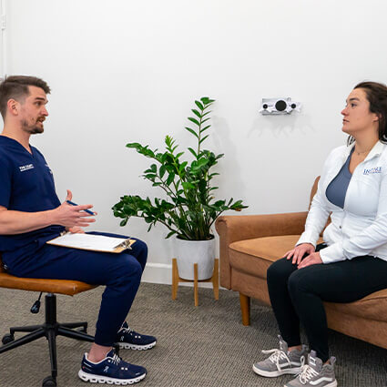 Consulting with patient