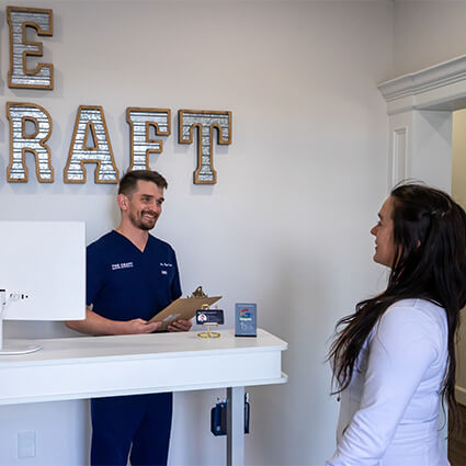 Dr. Ryan at front desk