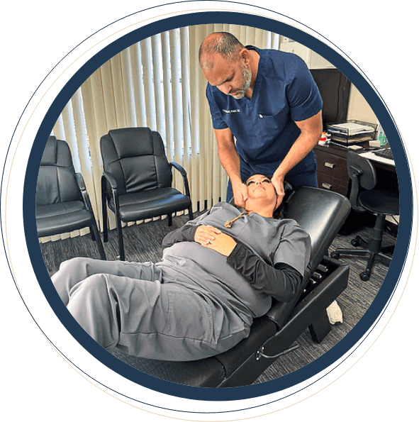 Stockton Chiropractor Dr. Thomas adjusting patient neck