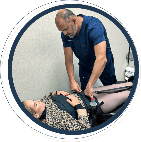 Stockton Chiropractor Dr. Thomas adjusting patient