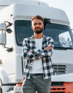 man in front of cargo truck
