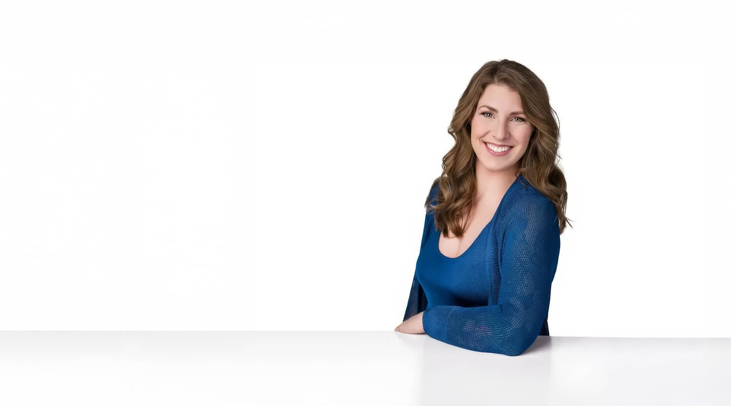 Denver chiropractor Dr Michelle wearing a blue blouse