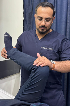 Chiropractor using physiotherapy to treat a Cork patient