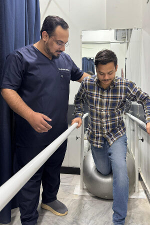 Cork chiropractor assisting patient with treadmill exercises