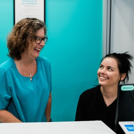 Smiling reception staff