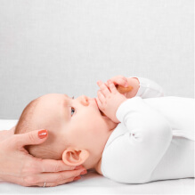 baby having neck adjusted