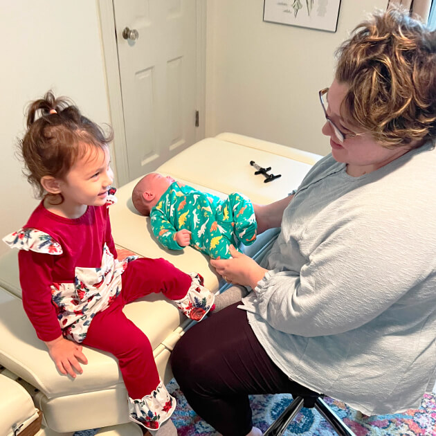 Arlington Dr. Alexia adjusting infant patient