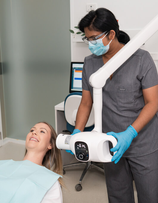 Croydon dentist examining patient's mouth