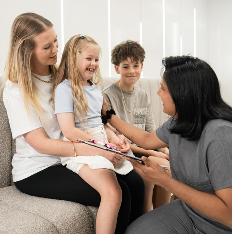 Croydon dentist talking to a young girl