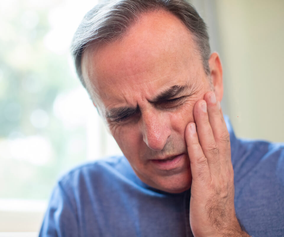 Man with tooth pain