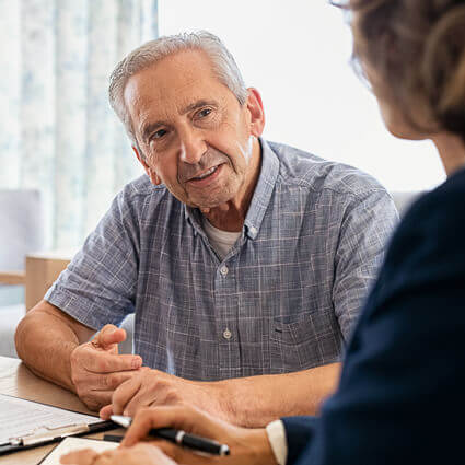 older man and woman during consulation