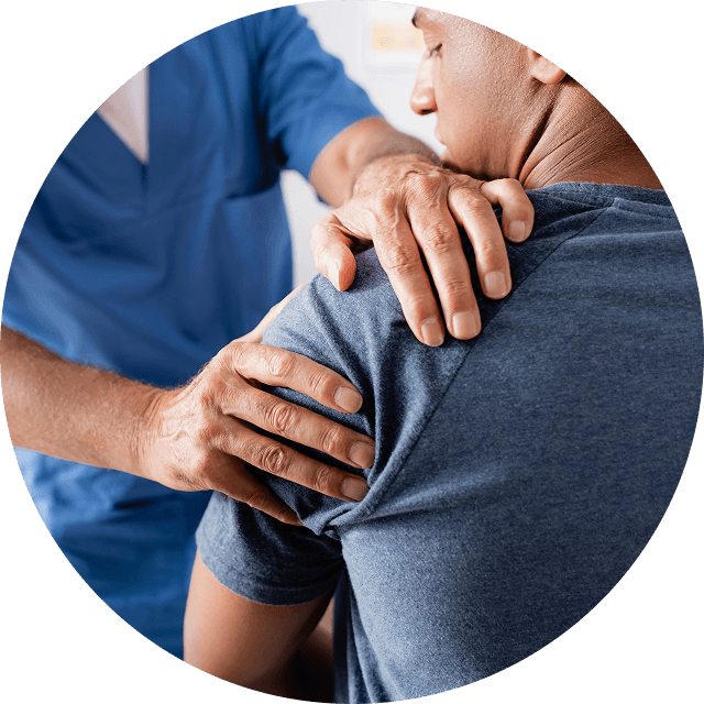 man having his shoulder adjusted